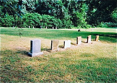 Image: Before: The grounds of St. Mary Cemetery before bulldozers operating on behalf of  Creek Land &amp; Cattle Company destroyed the foliage and damaged graves.