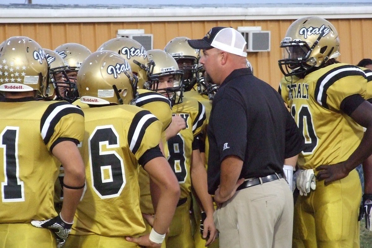 Image: Gladiator head coach Hank Hollywood fires up his troops during the pre-game.