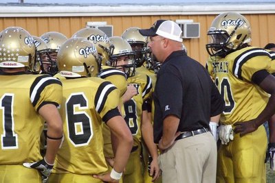 Image: Gladiator head coach Hank Hollywood fires up his troops during the pre-game.