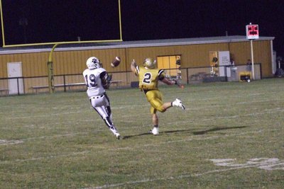 Image: Italy’s Chase Hamilton(2) deflects a sure touchdown pass for Hubbard at the last possible moment.