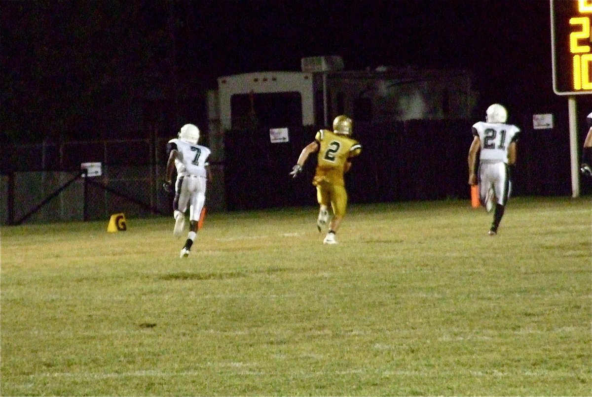 Image: Chase Hamilton(2) hauls in a pass from Ryheem Walker and finishes the 64-yard play for the only Gladiator touchdown on the night against Hubbard.