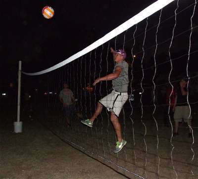 Image: Jase Holden shows his ability during a volleyball match.