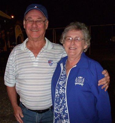 Image: Gloria and Bruce Utley show their support for the Italy Police Department during National Night Out. Mr. Utley is a member of the Italy City Council.