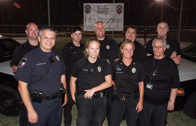 Image: The Italy Police Department was in full force while hosting National Night Out.
    Back row (L-R) Officer Shawn Martin, Officer Daniel Pitts, Chief Diron Hill, Officer Eric Tolliver and Officer Mike Richardson. Front Row (L-R) Reserve Officer Pedro Gonzalez, Officer Shelbee Landon, Sergeant Tierra Moony and department’s administrator Sue Lauhoff.