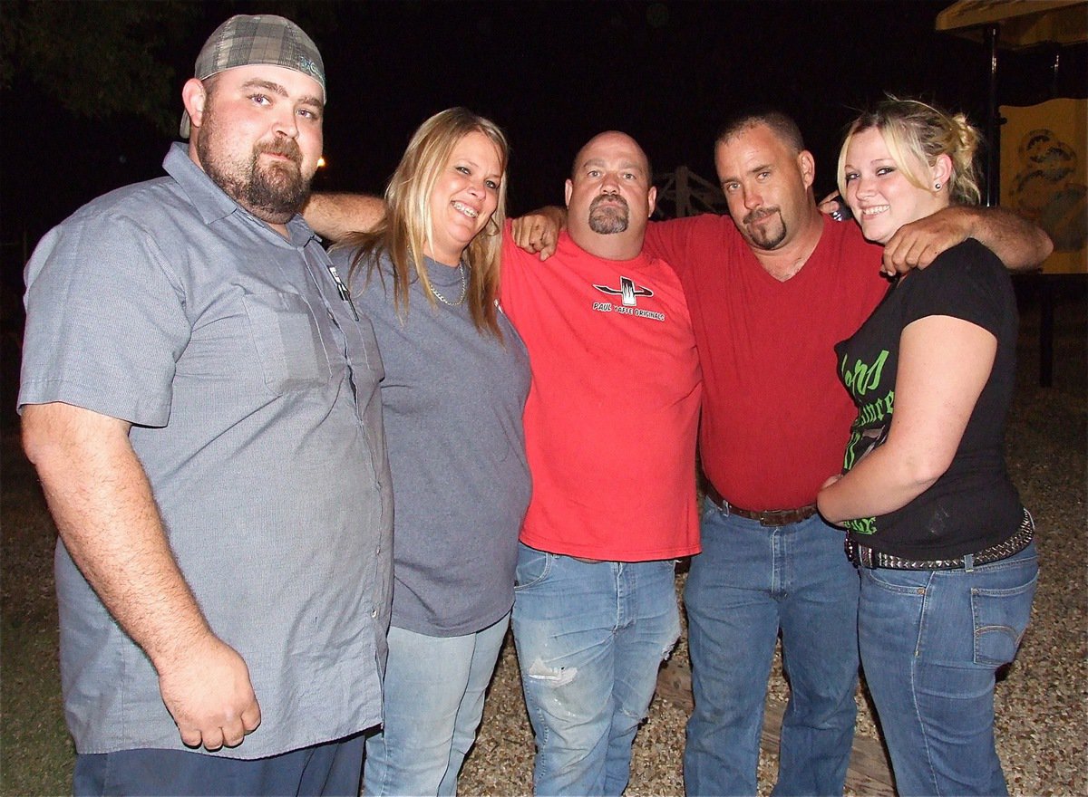 Image: Chris KinKaid, Cyndi McCarthy and her husband Carl McCarthy, Clint McCasland, and Coda McCarthy are a family of friends enjoying National Night Out.