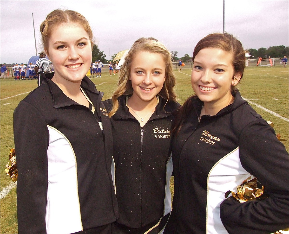 Image: Italy High School cheerleaders, Taylor Turner, Britney Chambers and Morgan Cockerham.