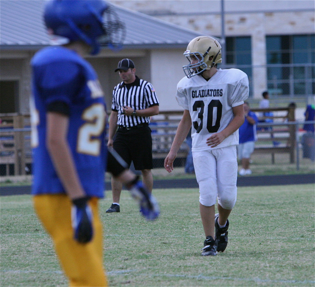 Image: Italy’s Blake Brewer(3) lines up against the Raiders during the 8th grade game.