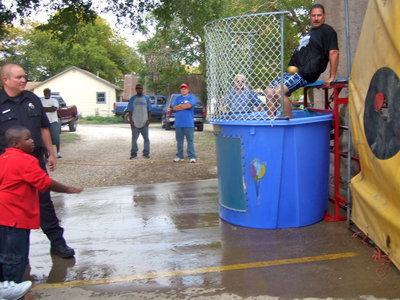 Image: Chief Phoenix is a sitting duck for the dunk tank. Will this young man hit the mark?