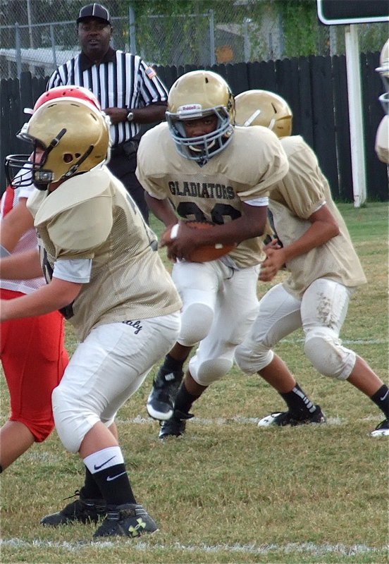 Image: Cade Roberts leads the way for Kendrick Norwood(20).