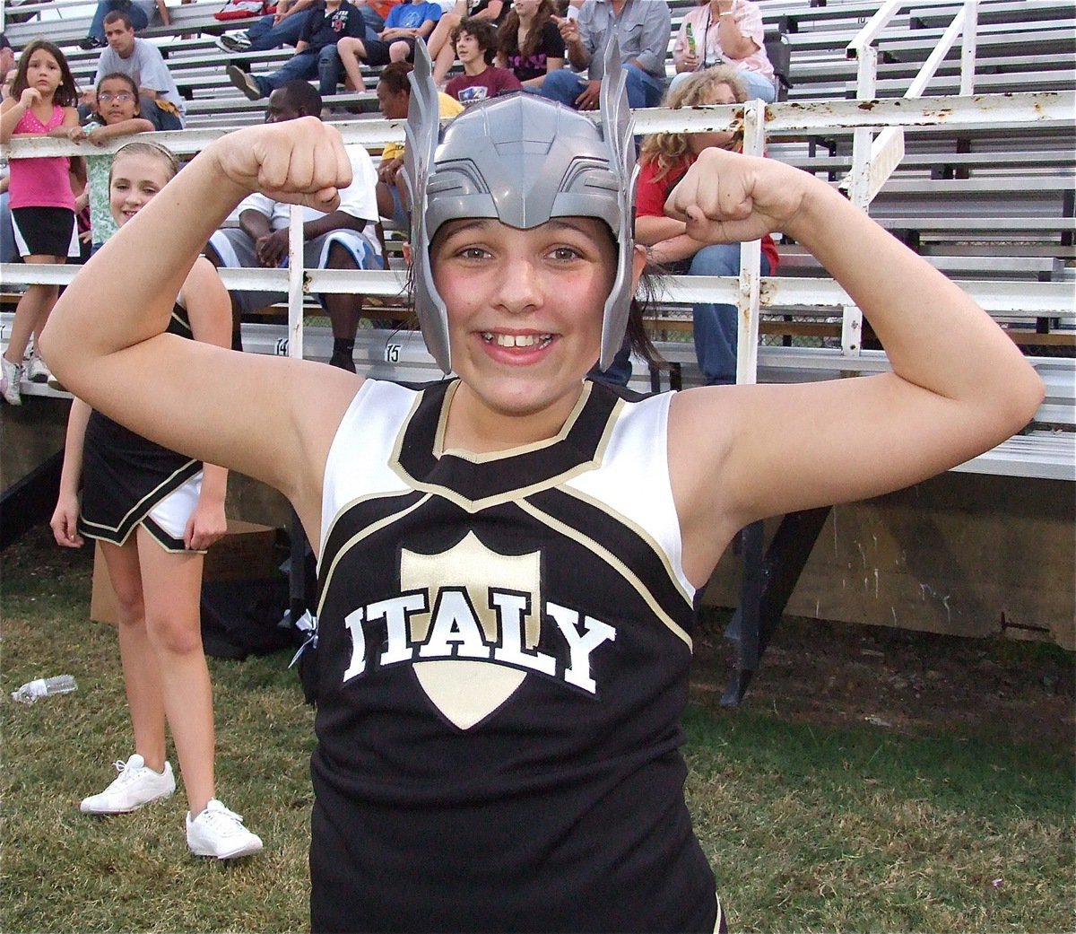 Image: IJH cheerleader Caroline Pittman and the Gladiators flex their muscles against Hico.