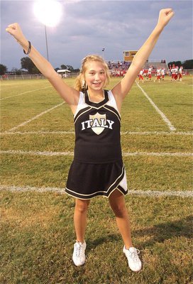 Image: IJH cheerleader Meagan Connor cheers on the 8th grade team.