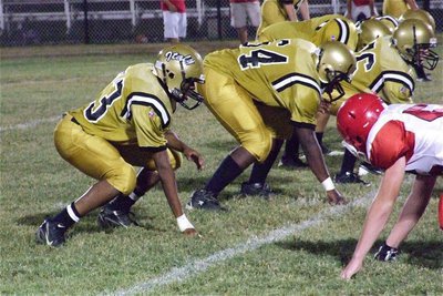 Image: Brandon Connor(76) is at center for Italy’s JV Gladiators with Justin Robbins(64) at right guard and John Hughes(63) is at tackle.