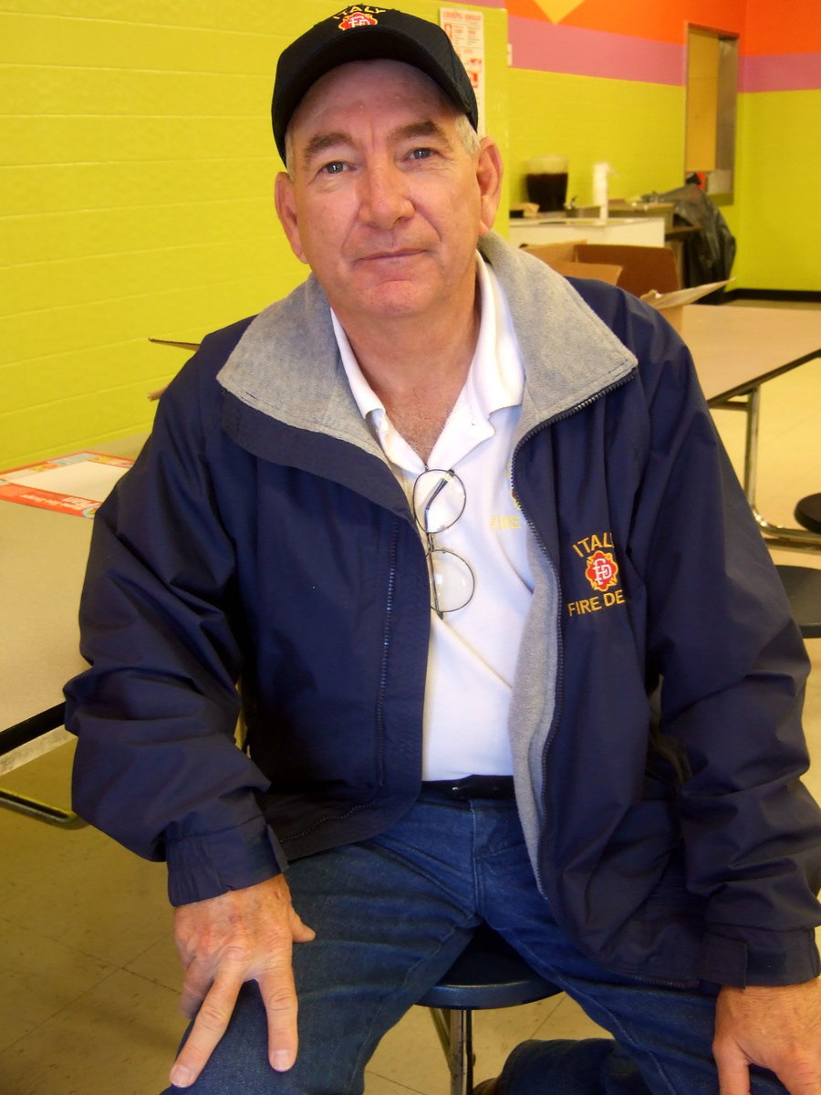 Image: Italy Volunteer Fire Chief happy to bring the fire engine to show the students.