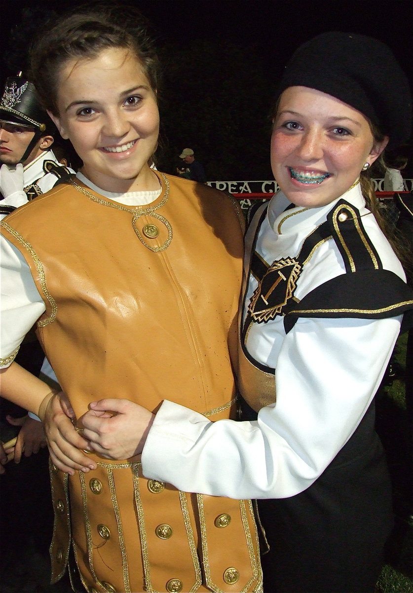 Image: Gladiator mascot Reagan Adams and Gladiator Regiment Band Member Maddie Pittman are having are enjoying halftime.