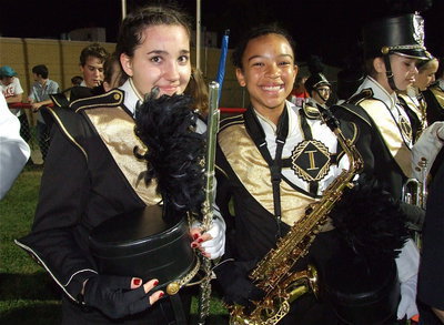 Image: Alexis Sampley and April Lusk and their band mates dress in full uniform against Hico.