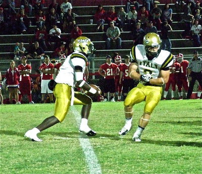 Image: Quarterback Marvin Cox(3) fakes the handoff to teammate Chase Hamilton(2) and runs a keeper. Cox was moved up from Italy’s JV squad to start against Hico.