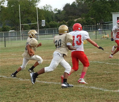 Image: Quarterback Tylan Wallace(10) gets into the open field for Italy’s 7th grade squad.