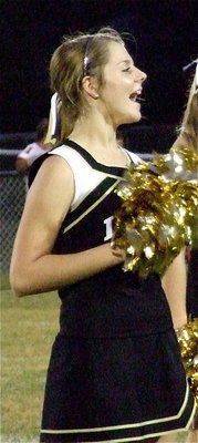 Image: Italy Junior High cheerleader Brooke DeBorde generates excitement before her cheer squad performs their halftime routine.