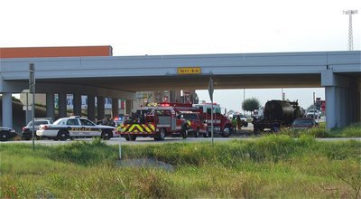 Image: The under bridge of Interstate 35E and Highway 34 was blocked off by law enforcement while Fire crews worked the scene of the collision.