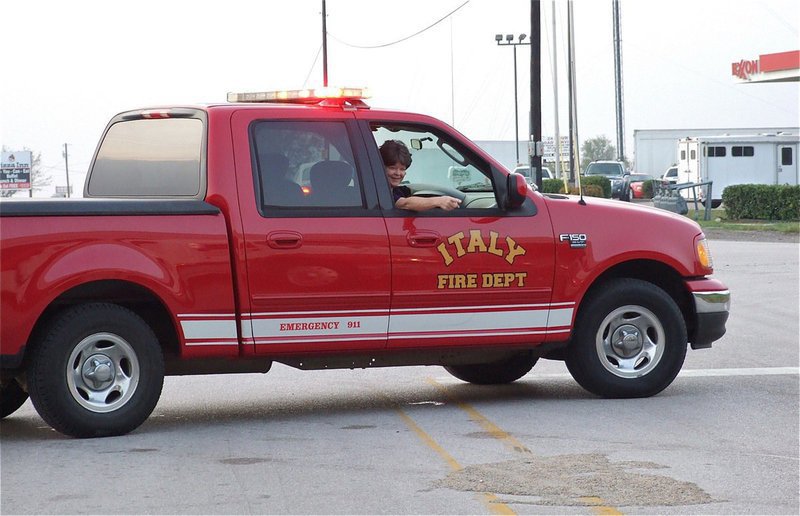 Image: Kay Chambers helped keep emergency workers hydrated as well as redirect the cameras.