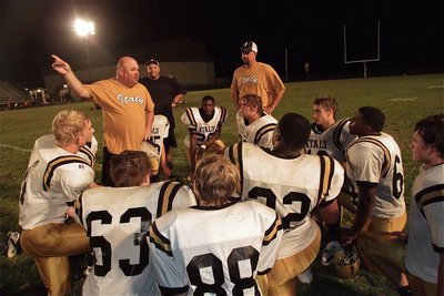 Image: Coach Wayne Rowe compliments his JV squad for a job well done against Itasca.