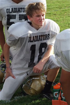 Image: 7th grade Gladiator Garrett Janek(18) enjoys a halftime lead over Itasca.