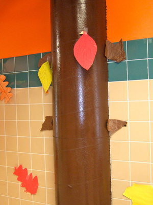 Image: The trunk of the tree is made out a card board culvert forms and painted brown.
