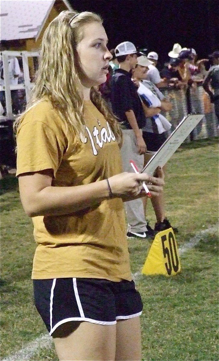 Image: Sophomore Lady Gladiator Jaclynn Lewis keeps stats during the game.