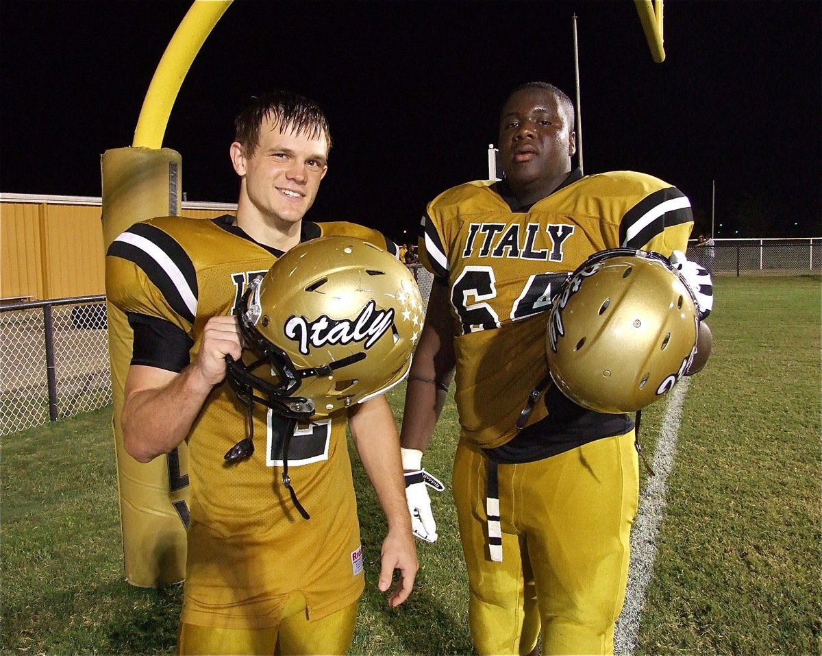 Image: Seniors Chase Hamilton(2) and Adrian Reed(64) help Italy get the job done against Itasca.