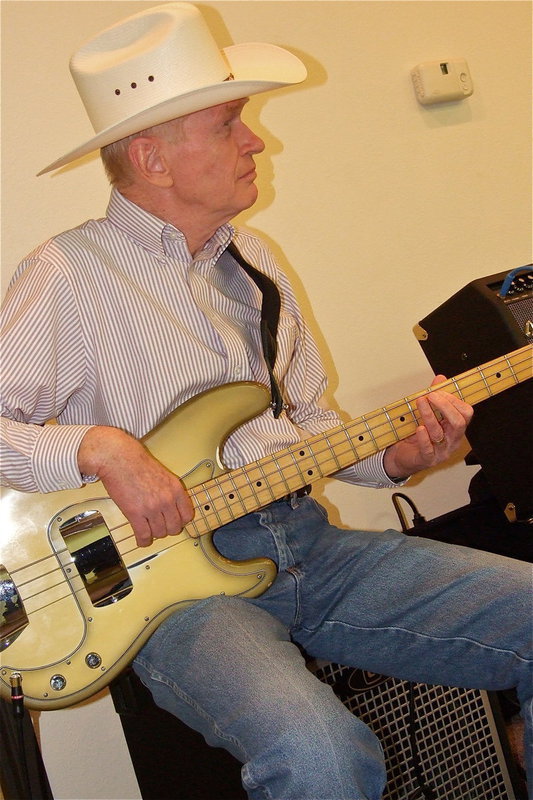 Image: Ray Lowry strummin’ the base guitar.