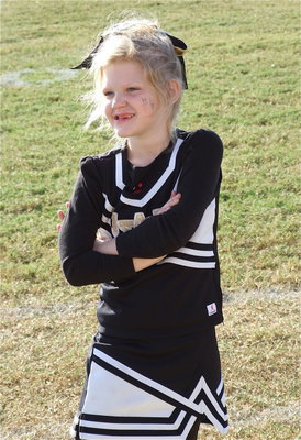 Image: C-Team cheerleader Hannah Krusen is all smiles during the homecoming game.