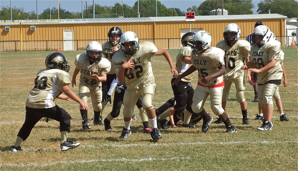 Image: Some players just will not be denied when they see the goal line as Jonathan Salas(82) heads straight into the end zone for an IYAA A-Team touchdown.