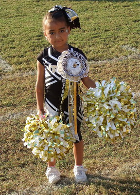 Image: Mums the word: The IYAAC-Team cheerleaders sports all the bling associated with homecoming.