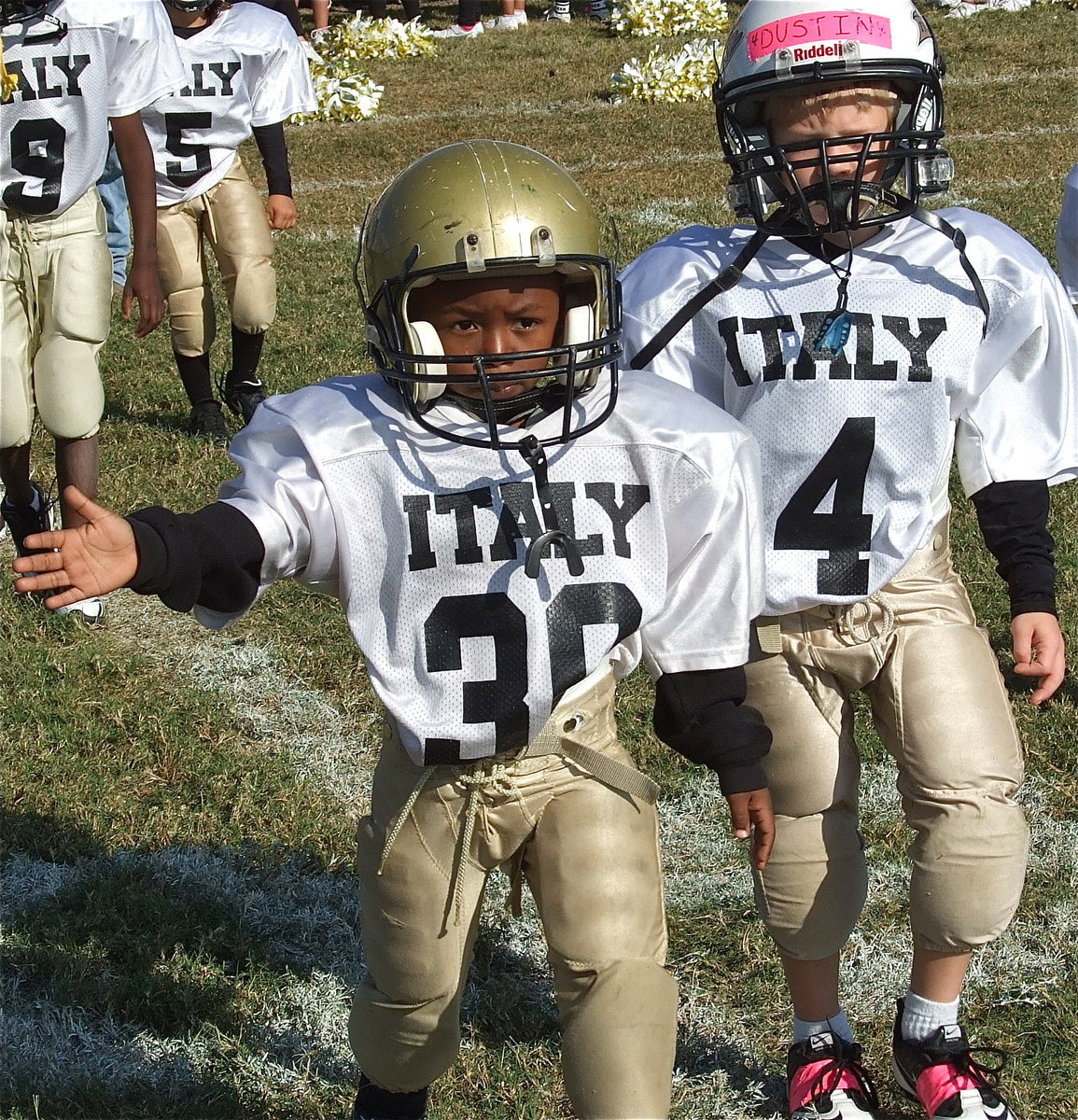 Image: Lucky Johnson(30) and Dustyn Duke(4) head out to congratulate Hubbard after the game. Slap hands! Slap hands!!