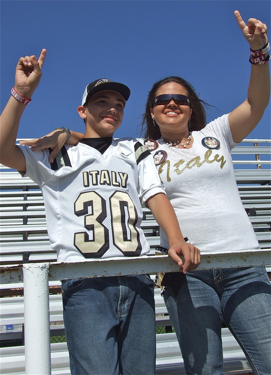 Image: Blake Brewer(30) and mom, Megan Brewer, cheer on Cade Brewer and Aedan Brewer, who both play for the IYAA A-Team.