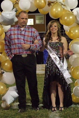 Image: 2012 IHS Homecoming Queen nominee Felicia Little is escorted by her father Steven Little.