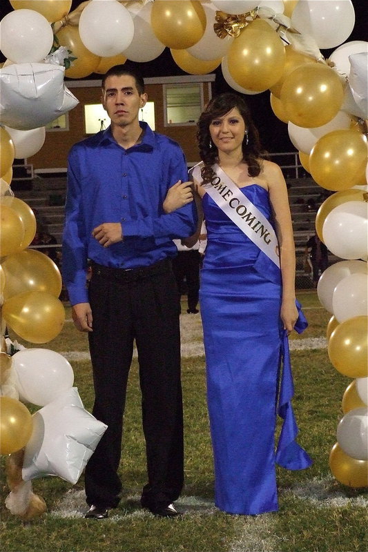 Image: 2012 IHS Homecoming Queen nominee Paola Mata is escorted by her brother Raul Mata.