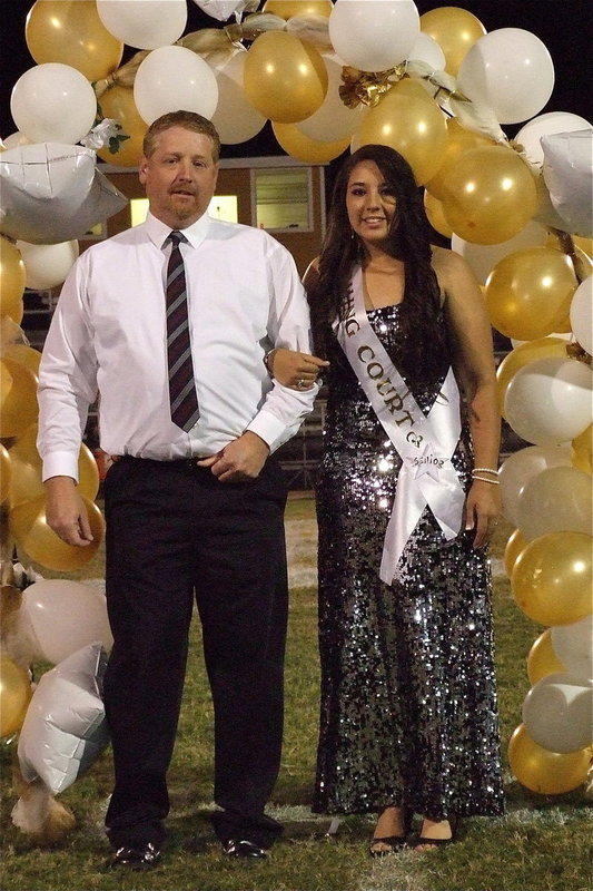 Image: 2012 IHS Homecoming Queen nominee Alyssa Richards is escorted by her father Allen Richards.