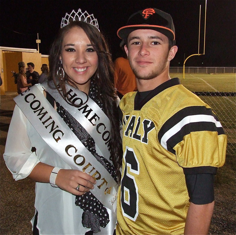 Image: 2012 IHS Homecoming Queen Alyssa Richards is accompanied by Gladiator Caden Jacinto(6) after the game.