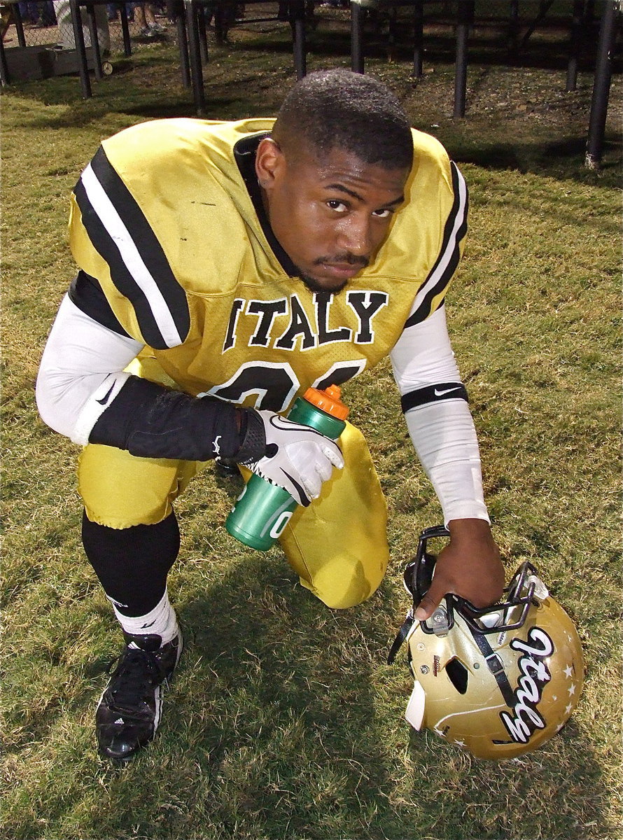 Image: Jalarnce Jamal Lewis(21) takes a breather after leading Marvin Cox into the end zone during a punt return that was called back on a penalty.