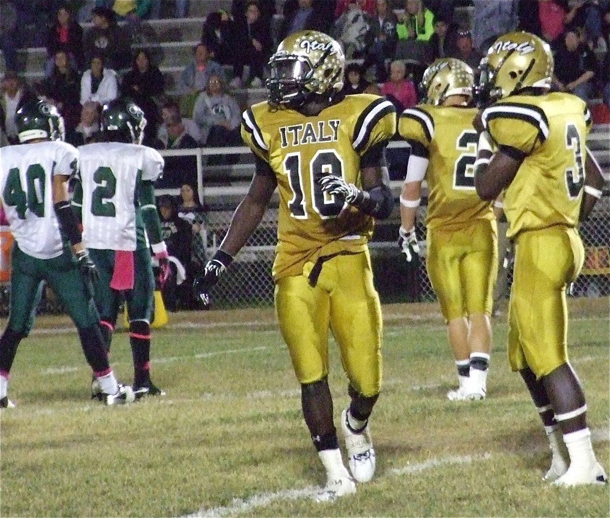 Image: Ryheem Walker(10), Marvin Cox(3) and Chase Hamilton(2) match up with Cross Roads as the Bobcats break their offensive huddle.