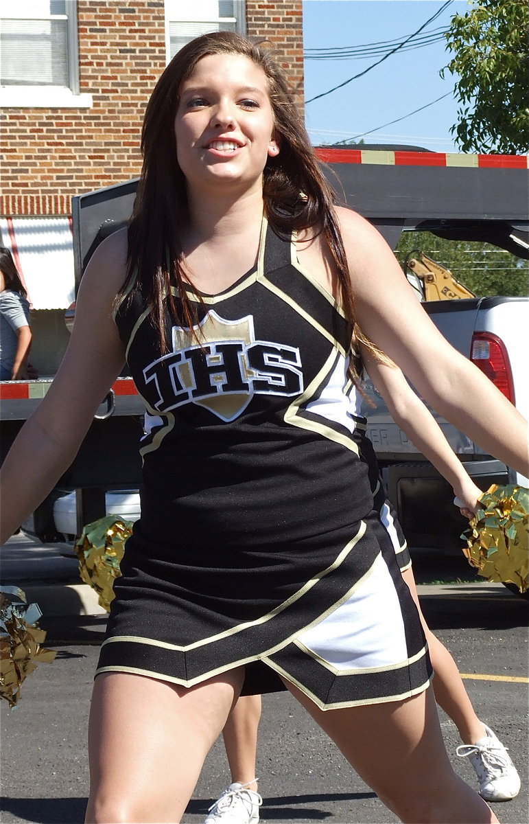 Image: Gladiator cheerleader Morgan Cockerham has that school spirit glow as she fires up Italy’s fans!