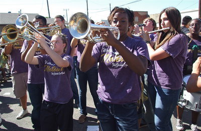 Image: Gladiator Regiment Band Members are Tara Wallis, Kortnei Johnson and Alexis Sampley play loud and proud during the pep rally.