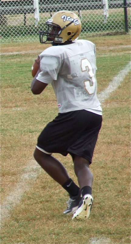 Image: Marvin Cox(3) searches for a receiver during an offensive set.