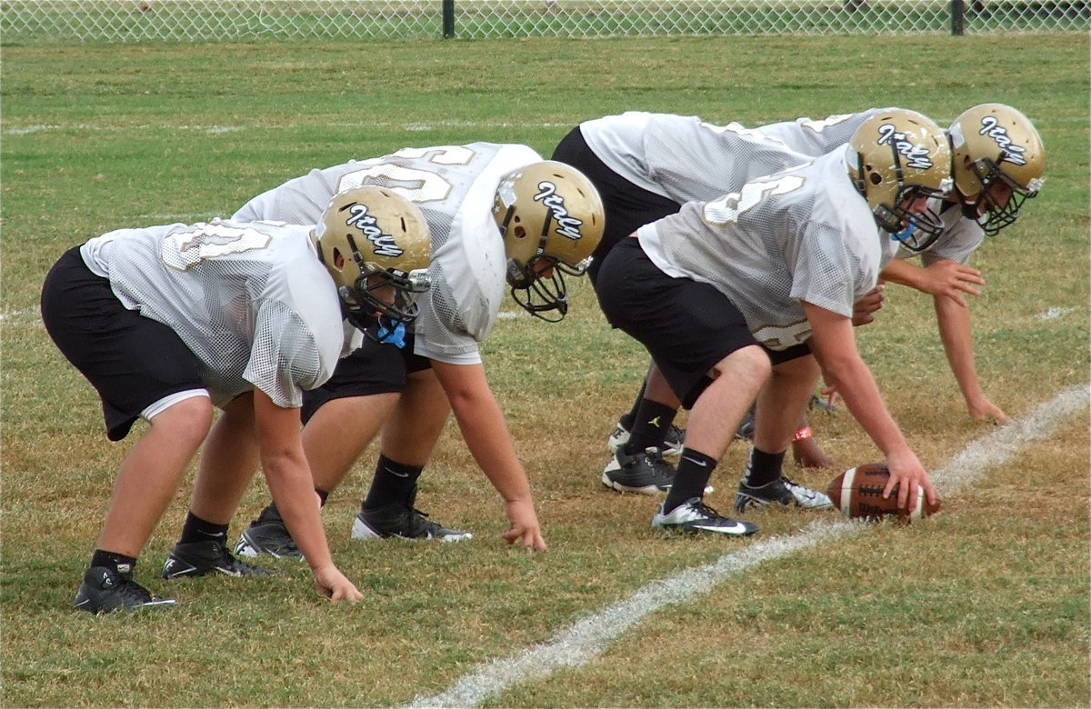 Image: Italy’s offensive line with left tackle, Cody Medrano, left guard Darol Mayberry(58), center Kyle Fortenberry(66), right guard Kevin Roldan(60) and right tackle Zain Byers(50)…four juniors and one sophomore with Fortenberry.