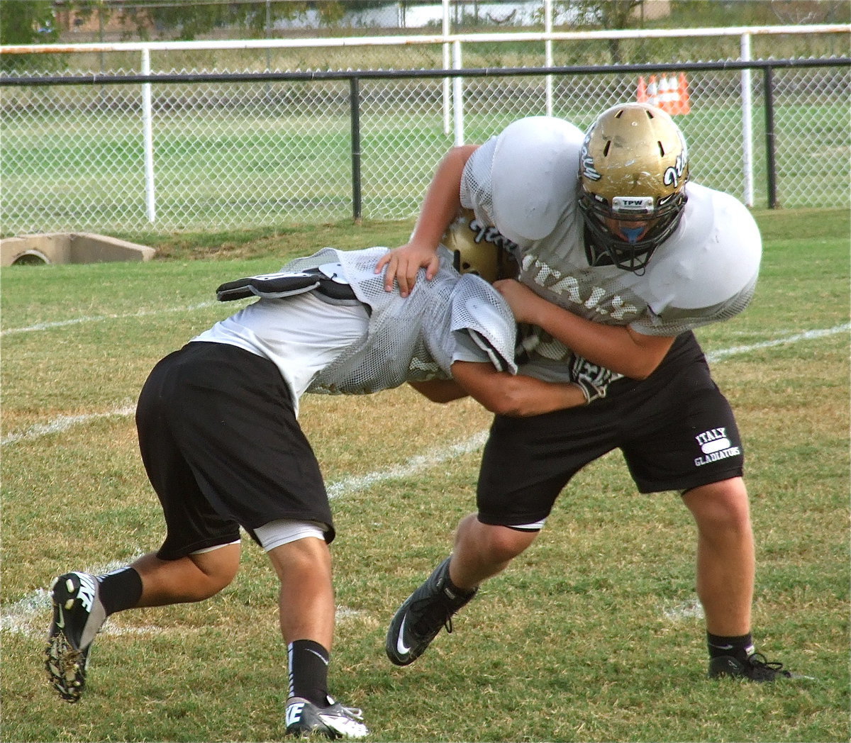 Image: This time, Reid Jacinto(11) tries to slow down Zain Byers(50).