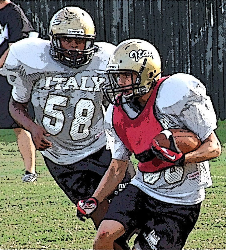 Image: Darol Mayberry(58) chases Kelvin Joffre(80) down the field.