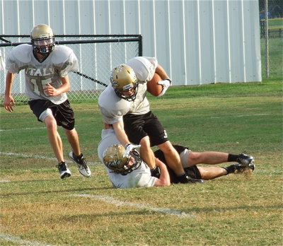 Image: Kyle Fortenberry(66) finally gets CHase hamilton(2) to the ground.