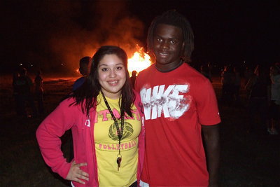 Image: Lady Gladiator volleyball ace Monserrat Figueroa and Gladiator Ryheem Walker are getting fired up during the bonfire.