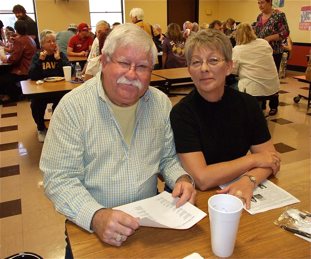 Image: Ronnie Graves and his wife Sheree Graves made the drive in from Kemp, Texas to support the George E. Scott Memorial Scholarship Fund and cheer for Gladiators during the homecoming game against Cross Roads.